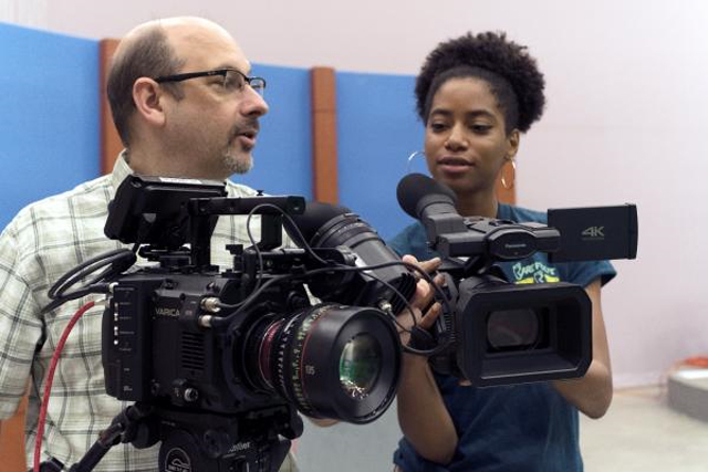 Eugene Martin demonstrates how to use one of the new Panasonic cameras.